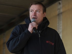 Chris Scott, owner of the Whistle Stop Cafe speaks during a rally against measures taken by government and health authorities to curb the spread of COVID-19 at his cafe in Mirror Alta, on Saturday May 8, 2021. The Whistle Stop was shut down by AHS for not complying with COVID-19 rules.