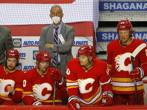 Calgary Flames coach Darryl Sutter looks on in the dying minutes of a 4-0 loss to the Winnipeg Jets at the Scotiabank Saddledome on May 5, 2021.