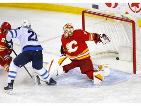 Calgary Flames goalie Jacob Markstrom is scored on by the Winnipeg Jets’ Paul Stastny at the Scotiabank Saddledome in Calgary on Wednesday, May 5, 2021.