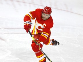 Calgary Flames Mark Giordano battles the Vancouver Canucks in first period NHL action at the Scotiabank Saddledome in Calgary on Wednesday, May 19, 2021. Darren Makowichuk/Postmedia