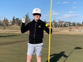 Chestermere's Griffin Maillot, 10, celebrates his hole-in-one on No. 6 at Lakeside Golf Club in April 2021.  (supplied photo)