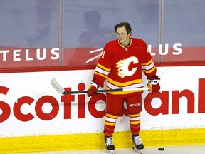 Calgary Flames Matthew Phillips  during warm up before taking on the Vancouver Canucks in NHL action at the Scotiabank Saddledome in Calgary on Wednesday, May 19, 2021. Darren Makowichuk/Postmedia