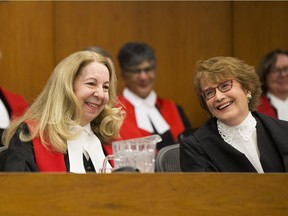 Court of Queen's Bench Chief Justice Mary Moreau (left) and Alberta Chief Justice Catherine Fraser, seen during Moreau's 2017 swearing-in.