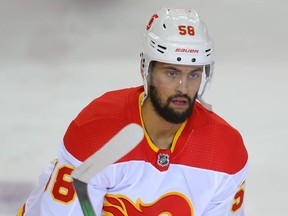 Calgary Flames Oliver Kylington during warm-up before an intrasquad game at NHL training camp in Calgary on Monday January 11, 2021. Al Charest / Postmedia