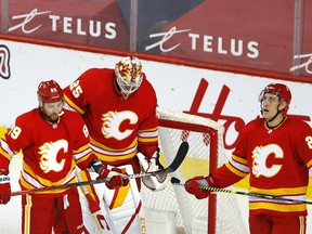 Flames goalie Jacob Markstrom reacts after surrendering a goal during a game against the Winnipeg Jets at the Scotiabank Saddledome in this photo from March 29.