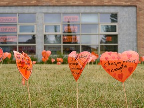Students at King George School have left orange hearts carrying heartfelt messages at the school’s front lawn to honour the memory of the hundreds of children whose remains have been found at unnamed gravesites in two residential schools in Canada on Thursday, June 24, 2021.