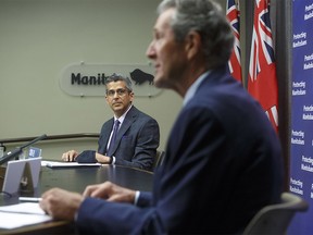 Premier Brian Pallister and Manny Atwal, president and CEO, Manitoba Liquor and Lotteries, during a vaccine incentive announcement Wednesday morning. The province will be offering nearly $2 million in cash and scholarships to encourage more Manitobans to get the shot this summer.