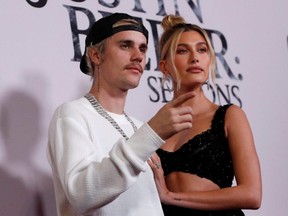 Singer Justin Bieber and his wife Hailey Baldwin pose at the premiere for the documentary television series "Justin Bieber: Seasons" in Los Angeles, Jan. 27, 2020.