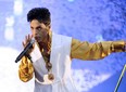 Prince performs on stage at the Stade de France in Saint-Denis, outside Paris, on June 30, 2011.