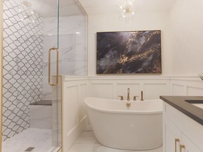 This master ensuite at the Views, by Statesman, includes a soaker tub and a shower with built-in bench.