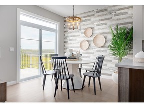 The dining area in the Aspen show home by Broadview Homes in Rivercrest, Cochrane.
