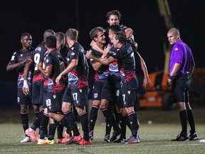 Cavalry FC players celebrate a goal against Forge FC during the Canadian Premier League’s Island Games in Charlottetown, P.E.I., on Aug. 13, 2020.