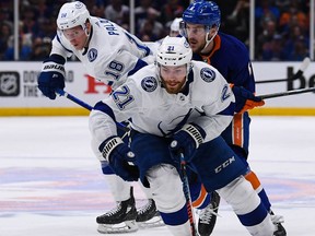 Jun 19, 2021; Uniondale, New York, USA; Tampa Bay Lightning center Brayden Point (21) skates across the blue line against the New York Islanders during the third period in game four of the 2021 Stanley Cup Semifinals at Nassau Veterans Memorial Coliseum. Mandatory Credit: Dennis Schneidler-USA TODAY Sports ORG XMIT: IMAGN-453251