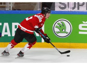 Team Canada defenceman Owen Power carries the puck during action at the IIHF World Championships in Riga, Latvia.