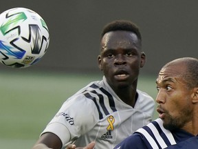 Karifa Yao (left) comes to Cavalry FC from the Montreal Impact of the MLS.