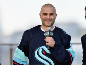 SEATTLE, WASHINGTON - JULY 21: Mark Giordano is selected by the Seattle Kraken during the 2021 NHL Expansion Draft at Gas Works Park on July 21, 2021 in Seattle, Washington. The Seattle Kraken is the National Hockey League's newest franchise and will begin play in October 2021.