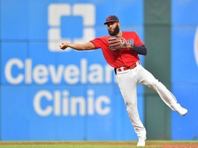 Shortstop Amed Rosario #1 of the Cleveland Indians throws out Yandy Diaz #2 of the Tampa Bay Rays at first to end the top of the sixth inning at Progressive Field on July 22, 2021 in Cleveland, Ohio.