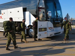 1st Battalion, Princess Patricia's Canadian Light Infantry (1 PPCLI) soldiers prepare to depart 3rd Canadian Division Support Base Edmonton en route to Vernon, B.C. July 23, 2021. The Canadian Armed Forces is deploying land forces to support local and provincial authorities in response to the emergency wildfire situation. Photo courtesy of: Lt(N) Kevin Moffat 1 Canadian Mechanized Brigade Group Public Affairs