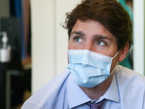 Prime Minister Justin Trudeau visits a vaccination site, amid the coronavirus disease (COVID-19) pandemic, in Montreal July 15, 2021.