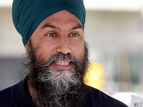 NDP Leader Jagmeet Singh speaks to reporters in Calgary on Saturday, July 17, 2021.