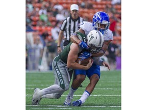 Boise State cornerback Jonathan Moxey sacks Hawaii quarterback Dru Brown during an NCAA game in Honolulu on Nov. 12, 2016.
