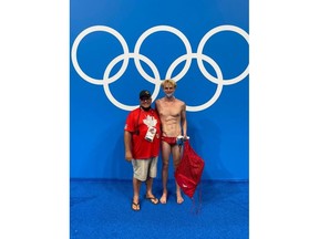 David Johnson with swimmer Cole Pratt.