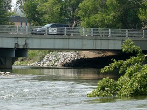 A woman was recovered from the Elbow River Friday afternoon near the Repsol Sport Centre by Macleod Trail and taken to hospital in critical condition. Friday, July 16, 2021. Brendan Miller/Postmedia