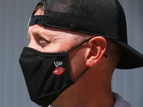 Calgary Stampeders QB Bo Levi Mitchell wears a team branded facemark as he leaves the CFL team's first training camp practice in Calgary on Saturday, July 10, 2021. Jim Wells/Postmedia