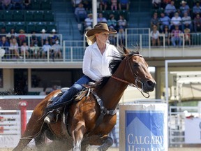Wenda Johnson from Pawhuska, OK, during the Ladies Barrel Racing event on day 4 of the 2021 Calgary Stampede rodeo on Monday, July 12, 2021. She raced to the top of the standings on Monday.  Darren Makowichuk/Postmedia