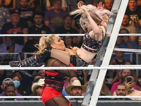 Natalya powerbombing Alexa Bliss onto a ladder at Money In the Bank!