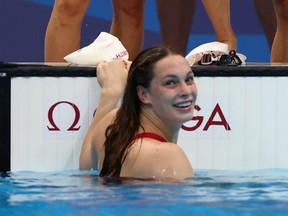 Penny Oleksiak of Canada celebrates after winning the silver medal in the Women's 4 x 100m Freestyle Relay, July 25, 2021. REUTERS/Kai Pfaffenbach