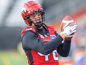 The Calgary Stampeders’ Charlie Power during warm-up before facing the Winnipeg Blue Bombers at McMahon Stadium on Oct. 19, 2019.