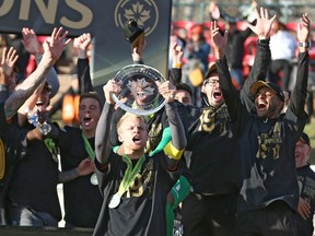 Forge FC hoists the trophy after the team won Leg 2 of the Canadian Premier League Championship  between Forge FC and Cavalry FC at ATCO Field at Spruce Meadows in this photo from Nov. 2, 2019.