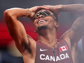 Andre De Grasse of Team Canada celebrates after winning the gold medal in the Men's 200m Final on day twelve of the Tokyo 2020 Olympic Games at Olympic Stadium on August 04, 2021 in Tokyo, Japan. (Photo by Christian Petersen/Getty Images)