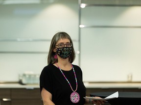 Dr. Deena Hinshaw, Alberta chief medical officer of health, arrives for her final regularly scheduled COVID-19 update during a press conference at the Federal Building in Edmonton, on Tuesday, June 29, 2021.