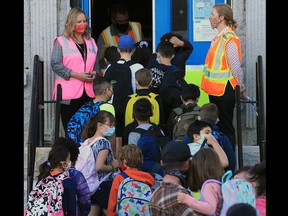 Students at Stanley Jones School head into classes on Tuesday, September 1, 2020.