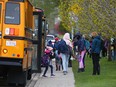 St. Pius X Elementary School students head back to school on May 25, 2021.