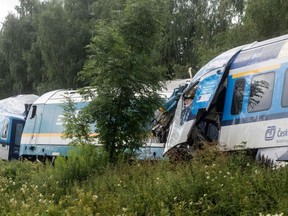 Two collided trains are pictured near the village of Milavce between the stations Domazlice and Blizejovn, Czech Republic, Wednesday, Aug. 4, 2021.