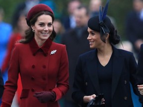 Catherine, Duchess of Cambridge and Meghan, Duchess of Sussex arrive to attend Christmas Day Church service at Church of St Mary Magdalene on the Sandringham estate on December 25, 2018 in King's Lynn, England.