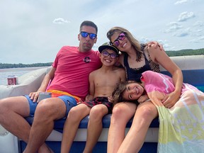 The Snows, from left, Chris, Cohen, Kelsie and Willa. Chris and his two kids will each get to throw a ceremonial first pitch at Fenway Park on Thursday.