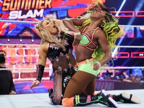 Natalya (left) defeated Naomi at SummerSlam in 2017 to win the Smackdown women’s championship.