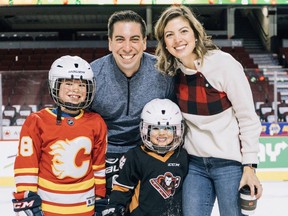 Photo of Flames assistant general manager Chris Snow for #TrickShot4Snowy feature - Christmas photo Chris,Kelsie  with their children, son Cohen and daughter Willa