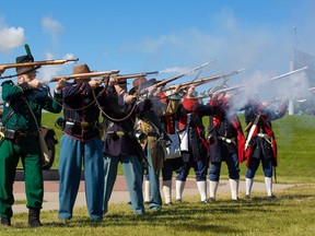The 18th Centrury Re-enactment Group and the Yankee Valley Yankees demonstrate black powder weapons at the Military Museums' Summer Skirmish event on Saturday, August 28, 2021.