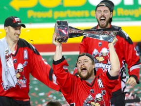 The Calgary Roughnecks’ Dane Dobbie raises the Champions Cup after winning the National Lacrosse League title by beating the Buffalo Bandits at the Saddledome on May 25, 2019.