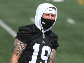 Stampeders Bo Levi Mitchell watches from the sidelines during practice at McMahon Stadium in Calgary on Saturday, July 24, 2021. Jim Wells/Postmedia