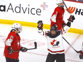 Canada’s Natalie Spooner celebrates a goal against Switzerland during the IIHF women’s world championship at WinSport Arena in Calgary on Tuesday, Aug. 24, 2021.