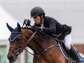 Ireland's Conor Swail rides Count Me In in the first round of the Cardel Homes Jumper competition in the International Ring at Spruce Meadows on Wednesday, September 1, 2021. Azin Ghaffari/Postmedia