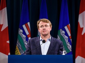 Health Minister Tyler Shandro announces the province's new COVID restrictions at McDougall Centre in Calgary on Friday, September 3, 2021.