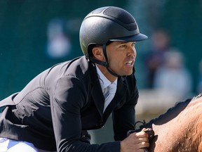U.S. rider Kent Farrington and Gazelle compete in the first round of the RBC Grand Prix of Canada at Spruce Meadows' International Ring on Saturday.