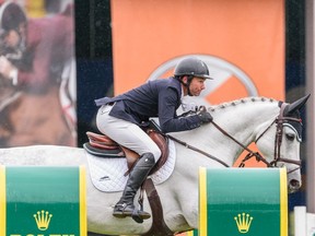 Canada's Brian Morton rides Cadillac at the Trimac Cup in the International Ring at Spruce Meadows on Wednesday.